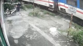 Wow: Man Drives onto Train Tracks on his own Front Yard....and just Stops