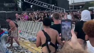 Someone Threw a Whole Fence during Fight at Concert
