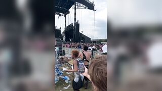Someone Threw a Whole Fence during Fight at Concert