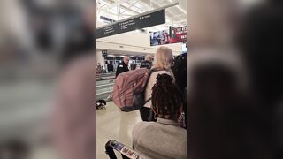 Woman Seen Yelling at Police Before Being Wheeled Away at Midway Airport