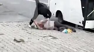 enraged woman beat up a pervert who was harassing a young woman on public transport.