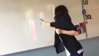 A school teacher pretends to shoot President Trump in front of her class.