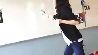 A school teacher pretends to shoot President Trump in front of her class.