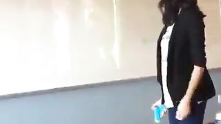 A school teacher pretends to shoot President Trump in front of her class.