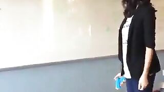 A school teacher pretends to shoot President Trump in front of her class.
