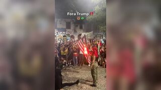 Brazilian activist set an American flag on fire to protest Trump support of Bolsonaro