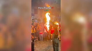 Brazilian activist set an American flag on fire to protest Trump support of Bolsonaro