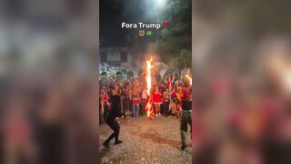 Brazilian activist set an American flag on fire to protest Trump support of Bolsonaro