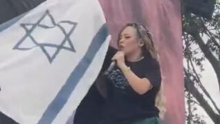 Colombian rapper Chelo Hop steps on Israeli flag, chants ‘Free Palestine’