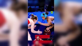 US wrestler DISQUALIFIED after poking Russian rival in the eye TWICE