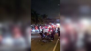 One of the Stoopid biker's bike fly up in the air