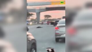 Hitmen pull man out of car and execute him in the middle of a highway in Ecuador