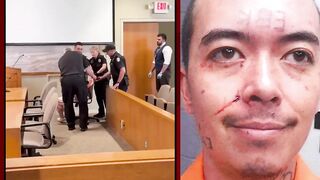 Man CARRIED into court after allegedly murdering his father and stepmother.