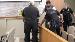 Kid accused of Killing his Parents carried like a baby into courtrom