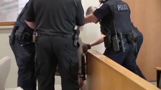 Kid accused of Killing his Parents carried like a baby into courtrom
