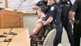 Kid accused of Killing his Parents carried like a baby into courtrom