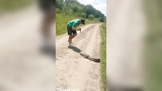 Why? Jerk wants a Knife to Kill Little Caiman Reptile..gets some Quick karma