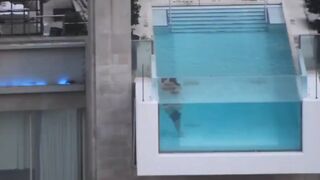 Shameless couple caught having sex in hotel pool