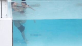 Shameless couple caught having sex in hotel pool