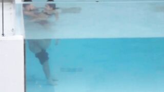 Shameless couple caught having sex in hotel pool