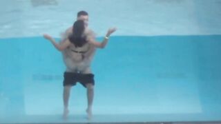 Shameless couple caught having sex in hotel pool