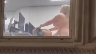 Busty Woman can be seen having Sex inside the office in full view window by passerby