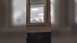 Busty Woman can be seen having Sex inside the office in full view window by passerby