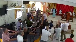 And the Band Played On..Crazy Man enters Church and starts Stabbing. Watch the Organ Player