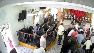 And the Band Played On..Crazy Man enters Church and starts Stabbing. Watch the Organ Player