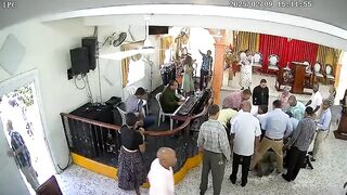 And the Band Played On..Crazy Man enters Church and starts Stabbing. Watch the Organ Player