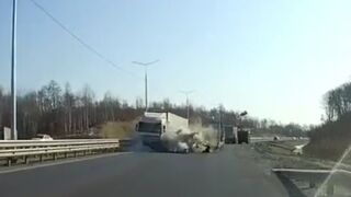 Toyota crushed between a Truck and a Trailer after a Failed Overtaking [Russia, February 11]