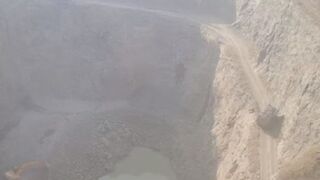 Watch the Truck Loaded with Stones at the Top of the Quarry. Driver Died