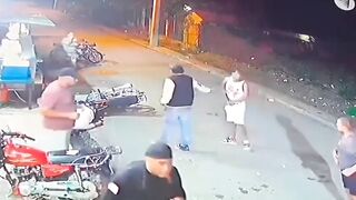 Big Mistake: Man Accidentally Shoots his Friend while Jumping Off Motorcycle to Stop a Fight