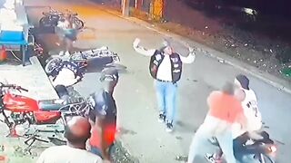Big Mistake: Man Accidentally Shoots his Friend while Jumping Off Motorcycle to Stop a Fight
