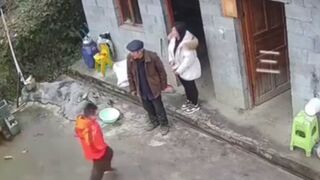 Little Chinese Kid Lights a Firework direct Hit to his Mom's Face