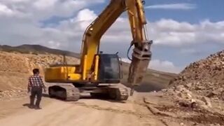 WARNING: To Avoid Near Decapitation Don't Try to Stop an Out of Control Excavator