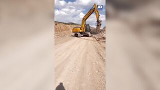 WARNING: To Avoid Near Decapitation Don't Try to Stop an Out of Control Excavator