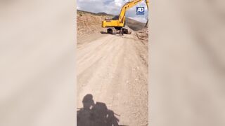 WARNING: To Avoid Near Decapitation Don't Try to Stop an Out of Control Excavator