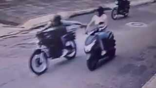 Woman is Dragged off of Her Motorcycle during Brazen Robbery