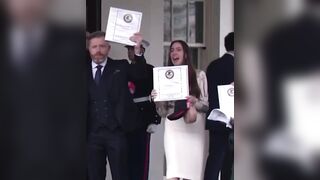 group of Journalists leave the White House holding Phase 1 of the Epstein file