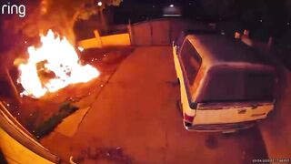 He enters the patio of a house to set fire to a car and catches fire himself
