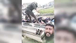 Assad Loyalists are Transported Whipped and Beaten like Cattle in Syria