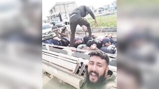 Assad Loyalists are Transported Whipped and Beaten like Cattle in Syria
