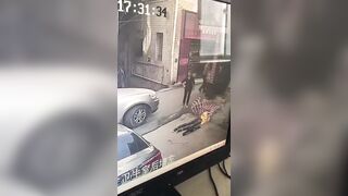 Crazy Man with a Cleaver Kills Innocent Man Talking to his Wife (Slo Mo at End)
