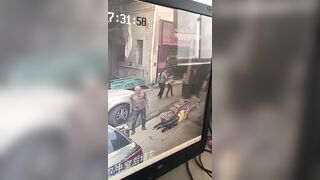 Crazy Man with a Cleaver Kills Innocent Man Talking to his Wife (Slo Mo at End)