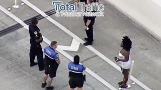 Following a traffic accident a woman gets out and stabs the driver of the other car
