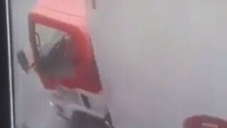 Woman Trips and Falls under Truck (Slo Mo)
