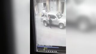 Woman Trips and Falls under Truck (Slo Mo)