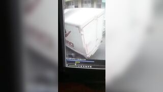 Woman Trips and Falls under Truck (Slo Mo)