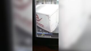 Woman Trips and Falls under Truck (Slo Mo)